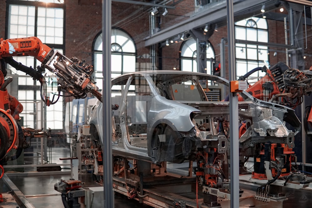 Robotic arms assembling on a production line — from concept to market